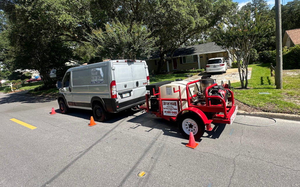 Gulf Coast Detailers mobile service van and pressure washing trailer on-site